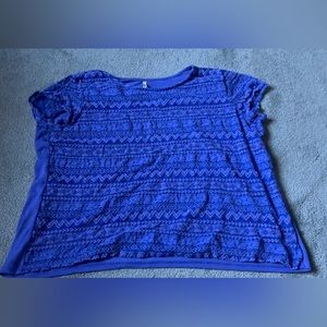 short sleeve leo nicale blue shirt with lace overlay
size XXL lightly worn